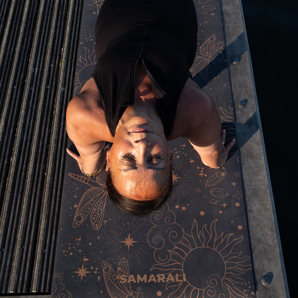 a female on the cork yoga mat Cosmic Harmony Cork Yoga Mat cork yoga mat
